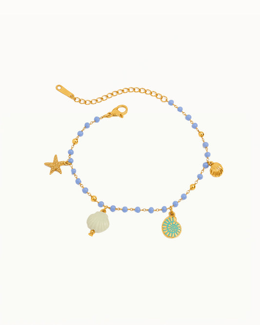 Gold Bracelet with Blue Beads &amp; Sea Charms - Brigitta